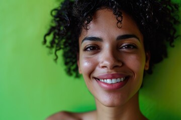 A close-up photograph of a person against a green background. This versatile image can be used in various projects