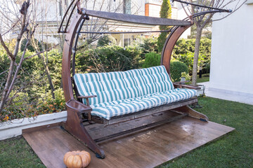 swing seat in the garden and time to relax and rest