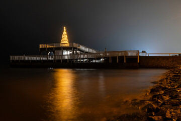 Alte Liebe (Old Love), famous observation deck in Cuxhaven, Germany at the river Elbe at Christmas time at night