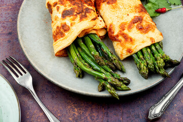 Tasty asparagus in an omelet.
