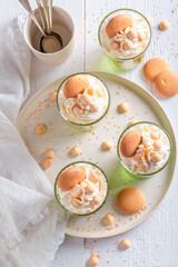 Homemade green jelly made of cream and fruits.