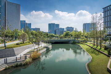 Fototapeta premium Modern business building next to the creek