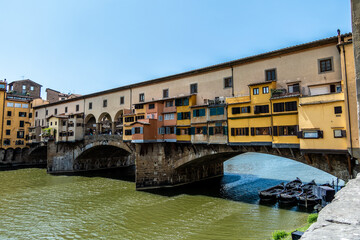 Fototapeta na wymiar Florence, Italy, July 25, 2023. Ponte Vecchio is a shopping arcade and pedestrian street.