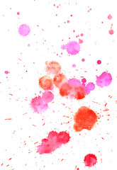 Splashes of watercolor paint on paper, red and purple colors