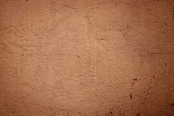 Rusty rough brown color wall closeup for background