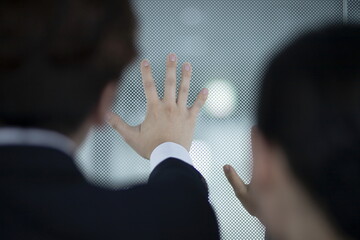 Close up of business people reaching hands