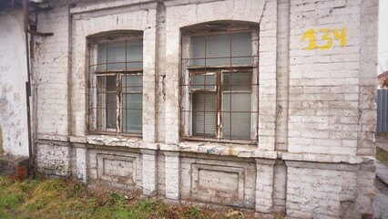 Fototapeta na wymiar Windows in the abandoned building