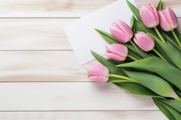 Colorful tulips on wooden table. Top view