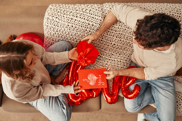 Valentine's Day. Couple in love at home.