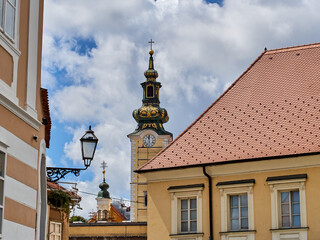 Tower of the Church of St. Mary at Dolac with a clock in a sunny day with beatiful clouds. Zagreb,...
