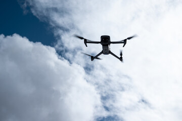 Flying drone in high altitude snow mountains