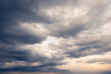 The sky is overcast with thick, grey stormy clouds looming overhead.