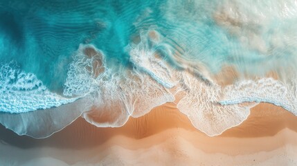 Sand beach from above with light blue water wave and sun lights