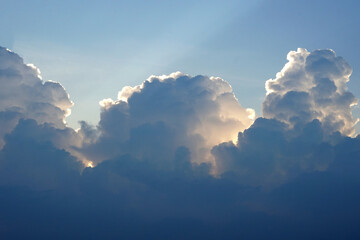 Beautiful light of the sun and clouds in the blue sky backgrounds