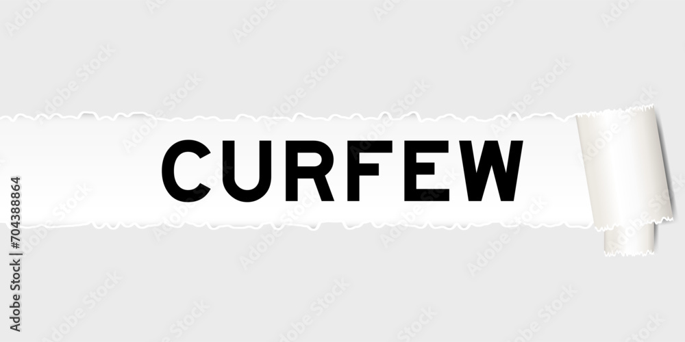 Sticker ripped gray paper background that have word curfew under torn part