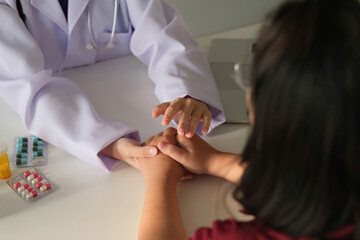Doctors hold hands and give advice to patients. Give encouragement in treat disease