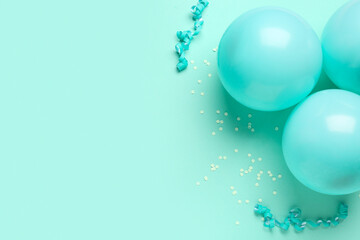 Blue balloons and ribbons, serpentine on color background