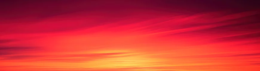 Foto auf Acrylglas Rich red, orange and yellow fiery sky - Fantasy vibrant panoramic sunset sky - Gradient rich colors - ethereal dreamy summer sunset or sunrise sky. Uplifting and peaceful sky. © ana