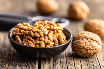 Peeled dried walnut kernels in bowl.