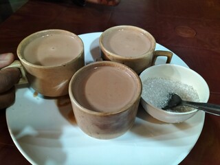 Tea Cups Filled with Delicious Milk Tea: A Flavorful Experience