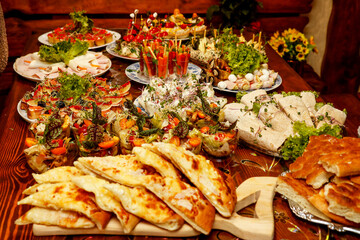 a wide variety of Georgian dishes on the table