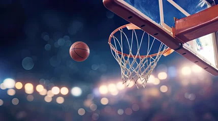 Poster moment when the basketball flies through the air towards the hoop  © buraratn