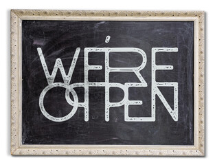 We are open sign written on a blackboard with ornamental frame
