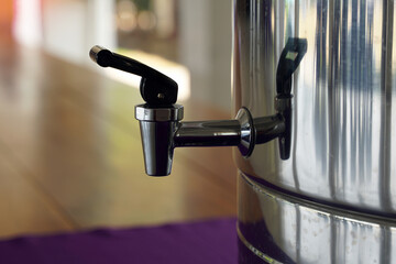 Stainless Steel Cooler Faucet To open the water, push the black plastic handle up and the water...