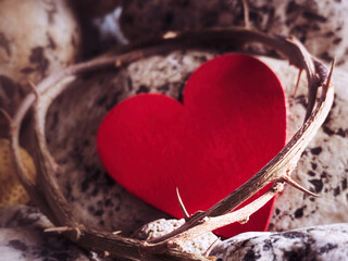 Lent, Holy Week, Good Friday, Easter Sunday Concept - Crown of thorns with blurry red heart shape...