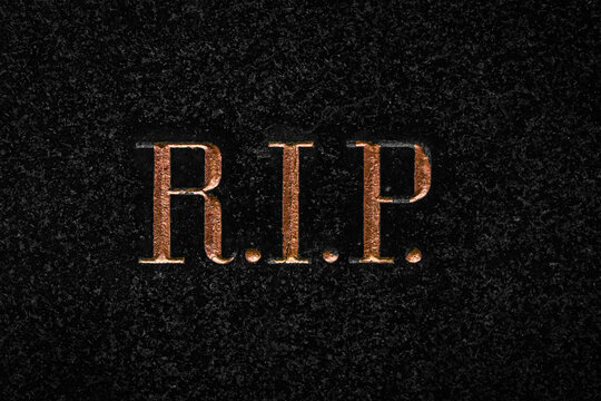 R.I.P. Inscription on a stone tablet