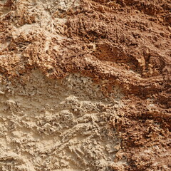 A mountainous sandy surface. Natural reddish texture