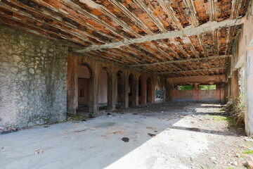Fototapeta na wymiar Undercover walkway in an abandoned building