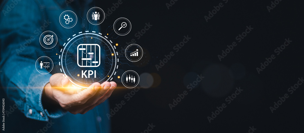 Poster kpi, business performance indicators, businessman holding with data management system on virtual scr