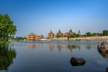 Orchha, India - 02 June 2022 - Royal Chhatris or Cenotaphs are the historical monuments situated on the banks of River Betwa in Orchha, Madhya Pradesh, India.