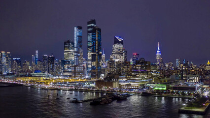 Fototapeta na wymiar new york city skyline at night, view over the river hudson