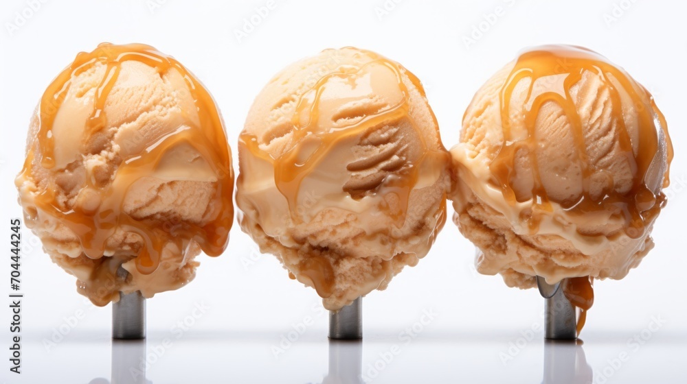 Poster a trio of salted caramel ice cream scoops captured in a close-up realistic photo against a white bac
