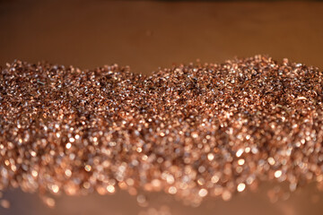 Copper shavings. Copper background.  Bokeh. Blurred foreground. Copy space.