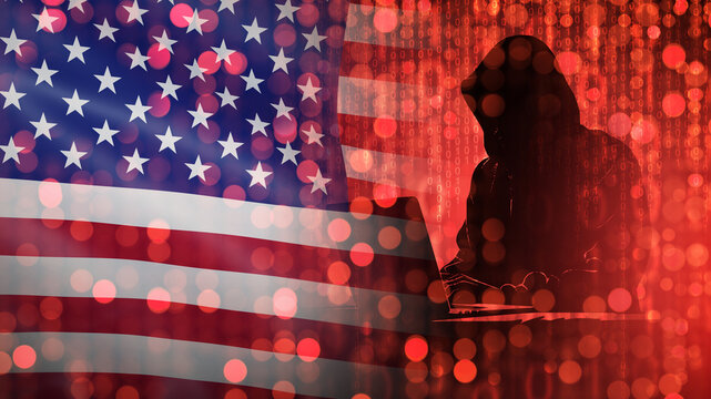 American hacker. US flag near cyber criminal. Hacker in hood near laptop. Silhouette American cyber criminal. Hacker breaks into US government website. Creates computer viruses against US. 3d image