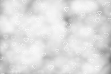 Beautiful bright silver white bokeh with hearts illustration background. Valentine's day holidays copy space greeting card.