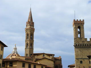 Obraz premium View of the Fiorentina Abbey Tower on a day. Close-up. Florence. Italy.
