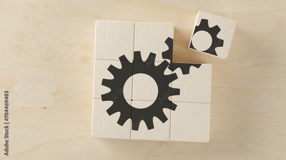 Poster array of wood cubes with cogwheels or gears symbol on wooden table flat lay top view from above, bus