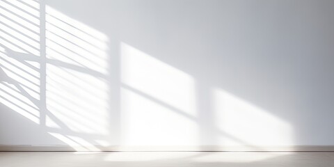 Shadowed window overlay on a white wall.