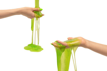 Green slime toy in woman hand with green nails isolated on a white background.