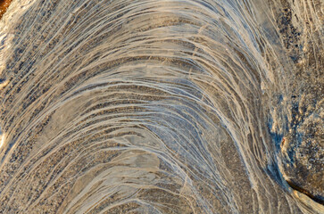 Contaminated water pattern on the beach at Ballywalter