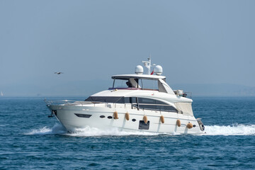 Fast motor yacht in navigation, sea view