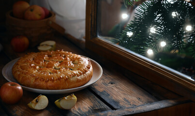 homemade apple pie on a wooden table