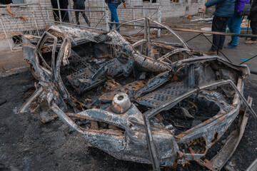 Shahed blew up houses. A bombed residential building and burnt cars after the strike. War in...