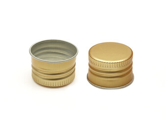 Golden color metal bottle cap two sides isolated on white background.
