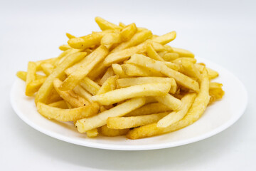 Large Pile of Basic French Fries on a White Plate