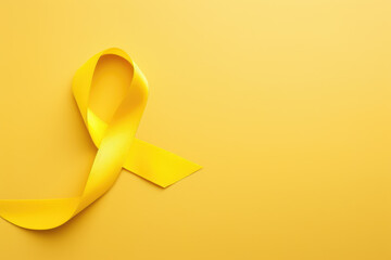 yellow Ribbon against white background for endometriosis awareness campaign, suicide prevention , a Childhood cancer.